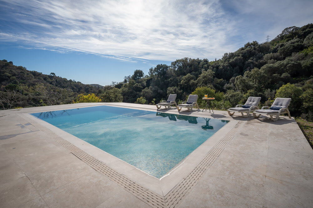 Our luxury swimming pool among nature at InnerLife Recovery rehab in Spain